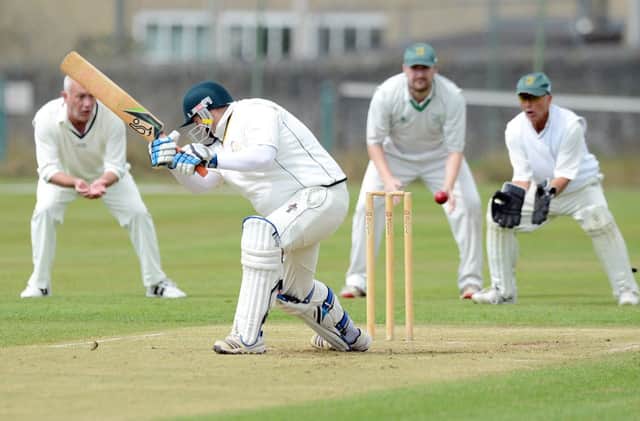 New Mills batsman Jonathan Duckworth in action.