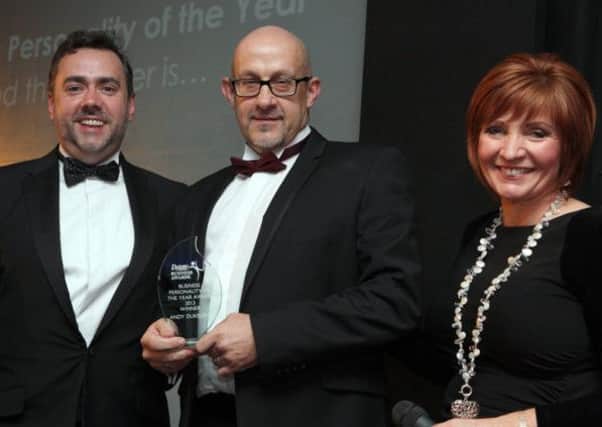 Andy Dukelow, centre, won Business Personality of the Year at the Business Awards 2013