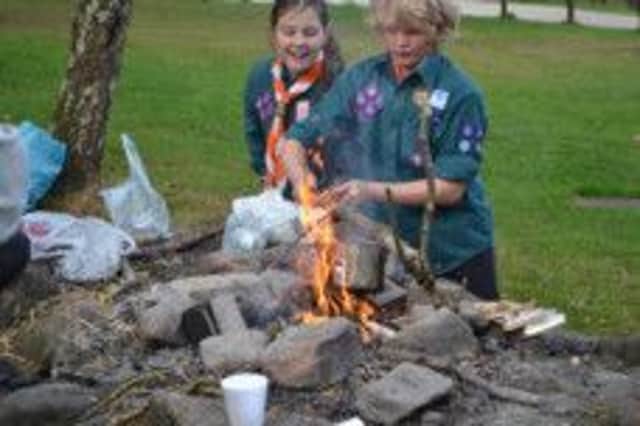 Young  Scouts enjoyed cooking over the weekend using camp fires.