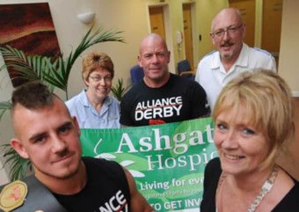 MMA fighter Jay Chadburn donates all proceeds from his last fight to Ashgate Hospice. Pictured l-r is Jay, nurse Anne Willows, John Chadburn, Ian Greenwood and Lynn Jones Community Fundraiser.