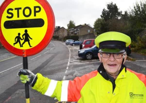 OAP Pater Vale, 80, has been a lollipop man for eight years at Highfields School, Matlock.