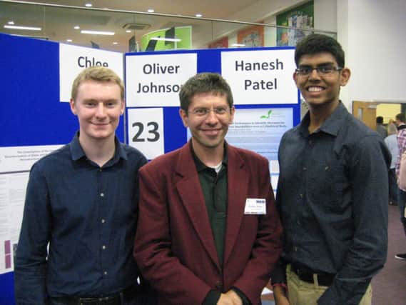 Award winning pupil Oliver (left) pictured with Hanesh Patel (right) and Professor J Paul Gostelow (centre).