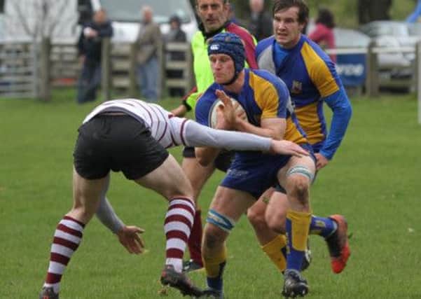 Jack Wagg attempts to make progress for Matlock on Saturday. Photo by Colin Baker.