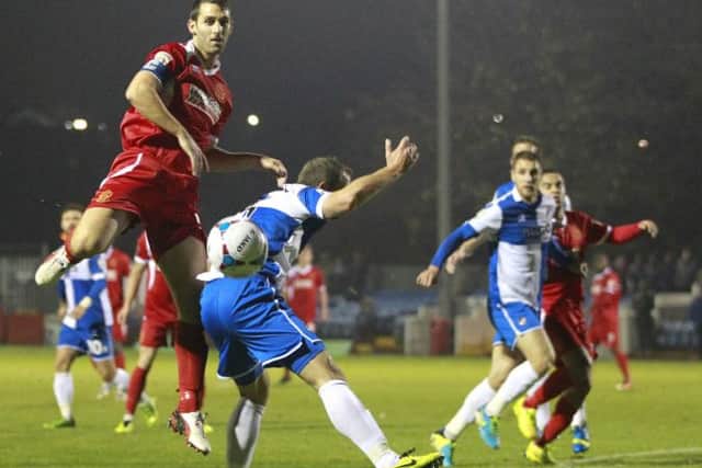 Skipper Luke Graham climbs above the Rovers defence -Pic by: Richard Parkes