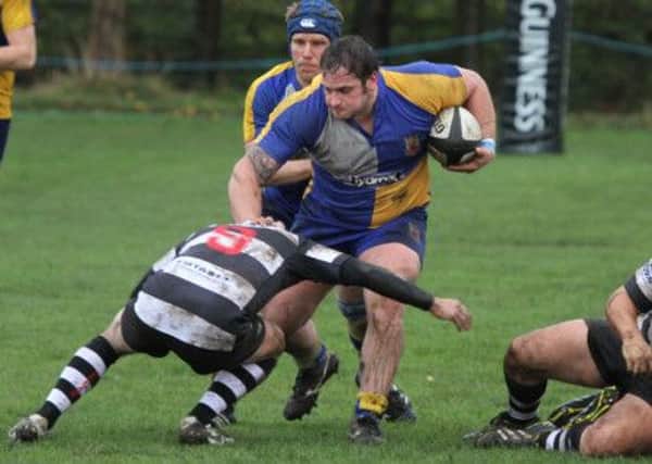 Matt Goodall is tackled by an opponent during the clash agaist Veseyans