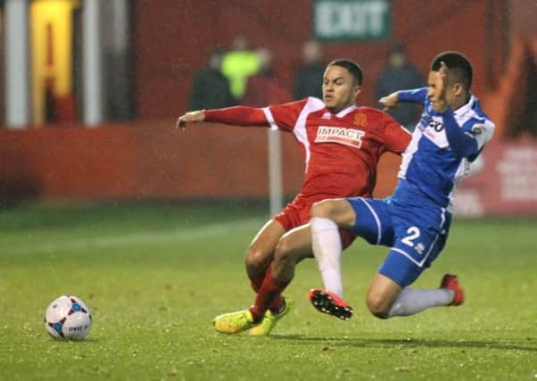 Alfreton's Nathan Hicks is foiled by Rovers defender Daniel Leadbitter -Pic by: Richard Parkes