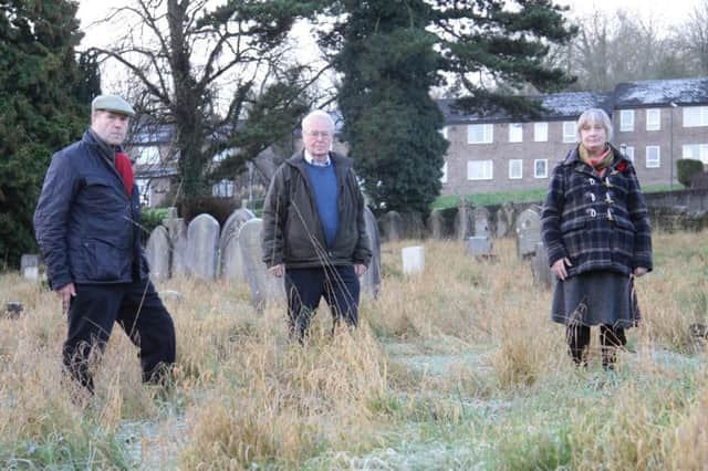 Cllr Garry Purdy and parish cllrs Russ Boyack and Joyce Pawley in St Marks Cemetery