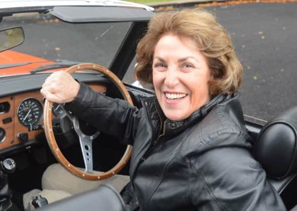 Edwina Currie and the classic Triumph Spitfire she drove on television
