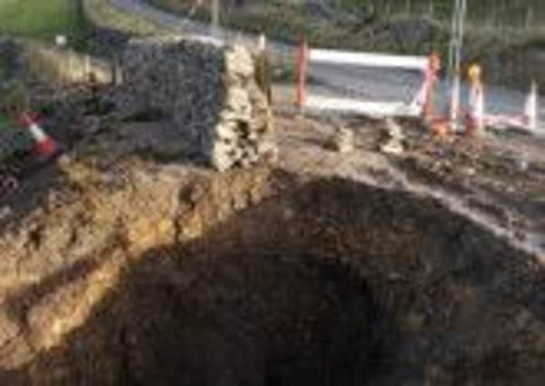 Pictured is the collapsed mineshaft at  the B6061 road from Sparrowpit to the top of the Winnats Pass, near Castleton.