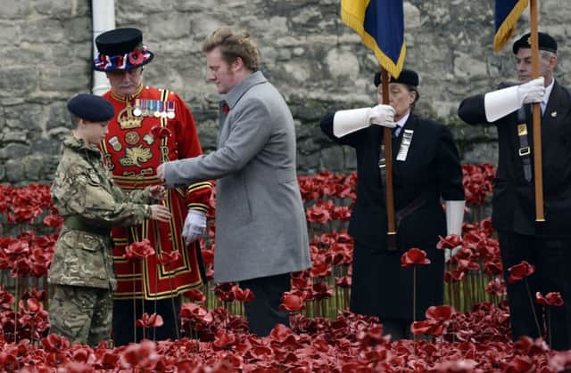 Artist Paul Cummins at the Tower of London. Andrew Matthews/PA Wire