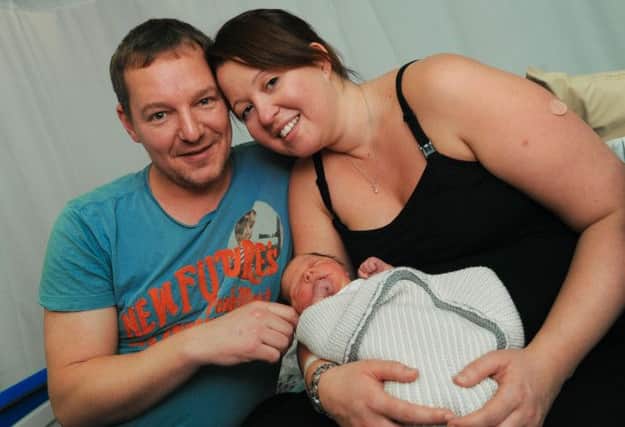 New Years Day babies at Chesterfield Royal Hospital. Pictured is Claire Jenkins and Andrew Smith from Tansley with Isla Edith born at 05:57.
