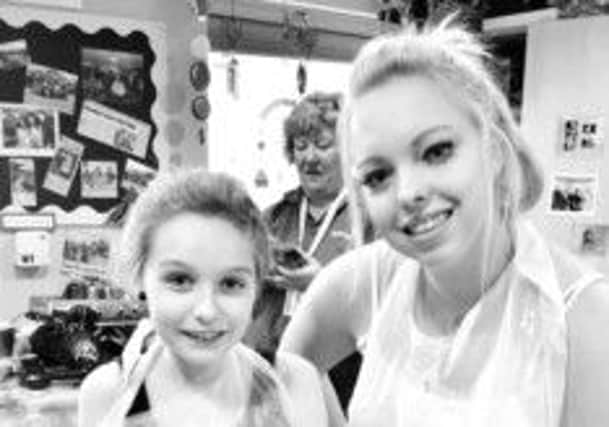 Pictured is Emilie Hackett, of Stonebroom, Alfreton, with her cousin Elliesha Hind who sadly passed away but has inspired Emilie to raise money for Bluebell Wood Hospice.