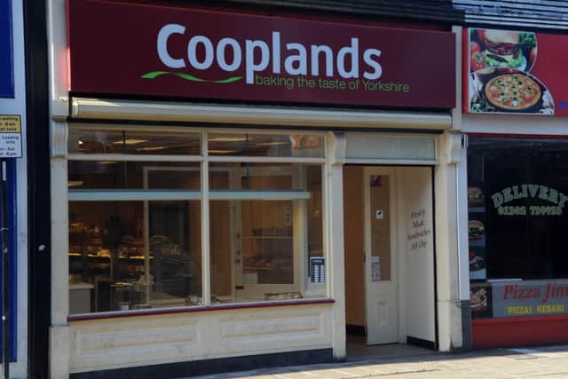A Cooplands branch in Silver Stree, Doncaster, and (below) a ntoce in the window of the Waterdale branch. Picture: Andrew Roe