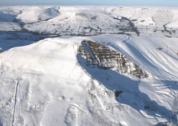Aerial pictures show the beautiful snow covered top of Mam Tor in the Peak District.

Paul Haxby / rossparry.co.uk