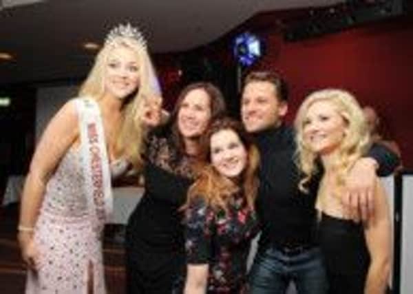 Miss Chesterfield Stephanie Hill, left, with Apprentice star James Hill and Ashgate Hospicecare staff and supporters.