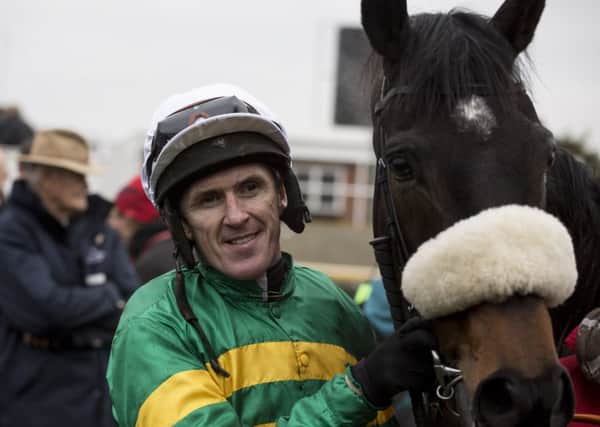 THE REAL MCCOY -- Tony McCoy with Mr Mole after his 200th winner of the season, and just before he announced his retirerment at Newbury last Saturday.  (PHOTO BY: Julian Herbert/PA Wire).