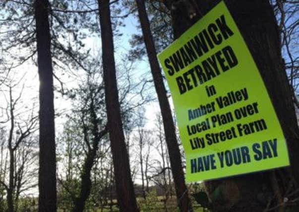 A protest sign concerning Peveril Securities' housing and multi-use site plans for the Lily Street Farm area, in Swanwick, which are being considered by Amber Valley Borough Council.