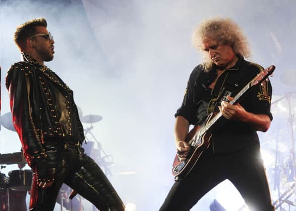 Programme Name: Queen and Adam Lambert Rock Big Ben  - TX: 31/12/2014 - Episode: Queen and Adam Lambert Rock Big Ben  (No. n/a) - Picture Shows:  Adam Lambert, Brian May - (C) Queen Productions Limited - Photographer: Neal Preston