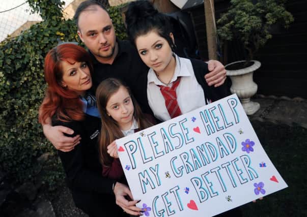 A Family in Long Eaton are calling on charitable donations to pay for private healthcare in the UK for the childrens grandfather who is currently living in The Ukraine. Pictured is Natalya Antonio, James Johnson, Alexandra Antonio 10 and Alina Antonio 14.