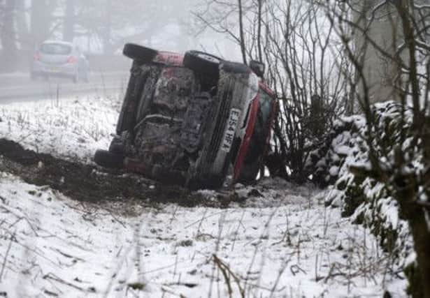 26/03/15

An overturned van lies in a ditch after skidding off the A515 near Hartington, after overnight snow in the Derbyshire Peak District.

All Rights Reserved - F Stop Press.  www.fstoppress.com. Tel: +44 (0)1335 418629 +44(0)7765 242650