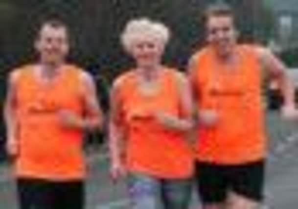 Helen Watson, her husband Richard and their friend Dave practise for the half-marathon.