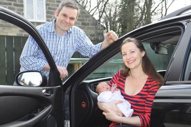 Ruth Whiffin and Matthew Howe with their new daughter, Eliza Rosie. Pictures by Jason Chadwick.