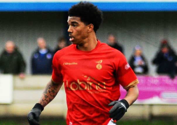 Rai Simons has signed a two-year deal with Chesterfield.