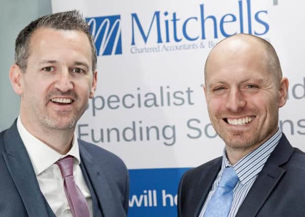 Pictured are Mitchells new partners Andrew McDaid and Tony Hornsby.