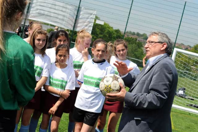 Graham Taylor gives an impromptu coaching session to year 7 and 8 pupils at the Belper Leisure Centre on Friday.