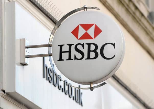 HSBC  is to cut between 22,000 and 25,000 jobs globally including a reported 8,000 in the UK as part of an overhaul to slash costs and reshape the business. PRESS ASSOCIATION Photo.