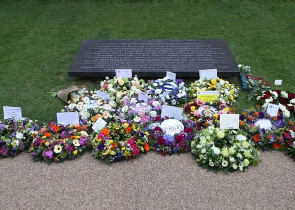 Wreaths laid at the July 7 memorial in Hyde Park, London, as Britain remembers the July 7 attacks amid a welter of warnings about the enduring and changing threat from terrorism a decade on. PRESS ASSOCIATION Photo. Picture date: Tuesday July 7, 2015. See PA story MEMORIAL July7. Photo credit should read: Steve Parsons/PA Wire