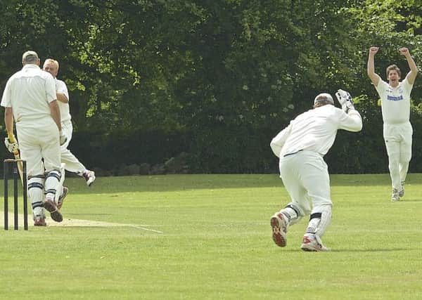 Belper Meadows' Chris Whitely takes a catch behind the wicket of the bowling of Matt Jones