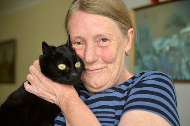 Jan Cheeseman is reunited with Freya the cat after missing for 8 years