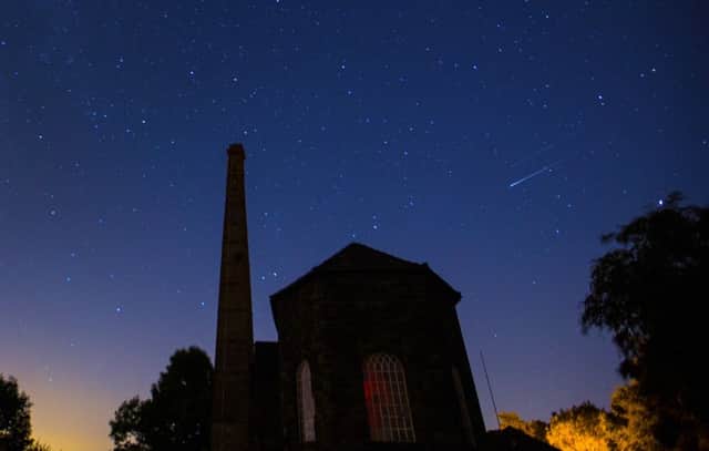 In the early hours of Tuesday morning, a shooting star streaks across the Milky Way high above Middleton Top, the last surviving winding engine from the long-closed Cromford and High Peak Railway, near Wirksworth.  Photo -  F Stop Press Ltd.