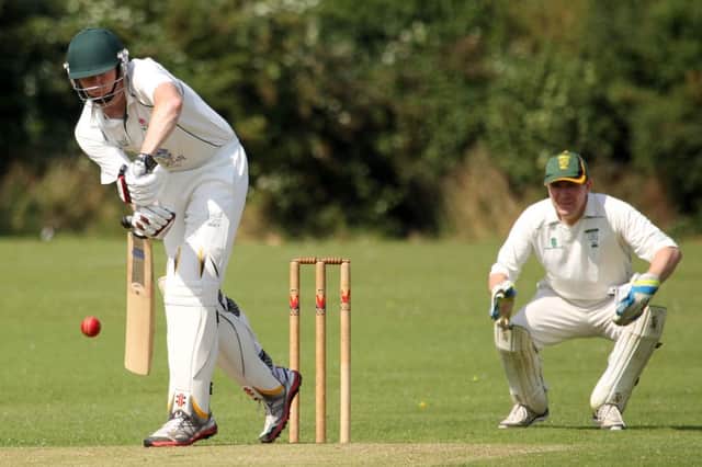 Action from Roses v Glapwell Colliery CC II at Roses North Warren Road ground. Roses batsman Andrew West.