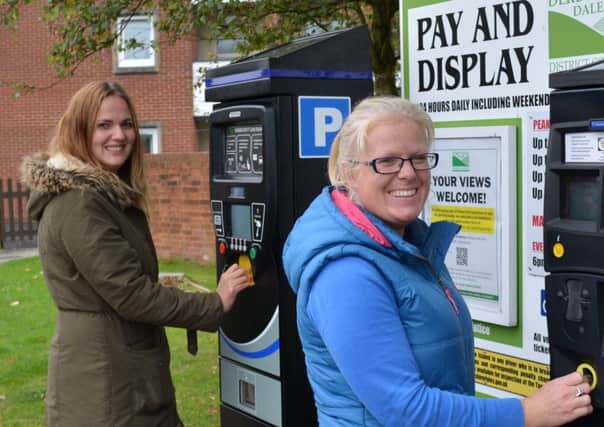 New ticket machines are coming to Dales car parks after testing in Ashbourne - pictured are Helen Spencer and Helen Carrington testing machines.