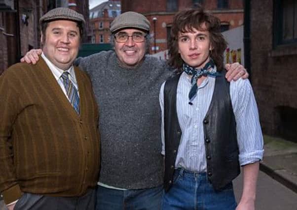 Funnyman Peter Kay, who scored a success with Car Share, returns to sitcom in Cradle to Grave, an eight-part adaptation of DJ/ presenter Danny Baker's autobiography, starting tomorrow night on BBC2. Also pictured, right, is Laurie Kynaston as the young Danny.