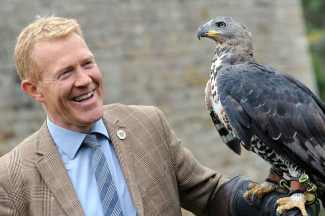 Chatsworth Country Fair.
TV presenter Adam Henson with Jura the African Crowned Hawk Eagle.