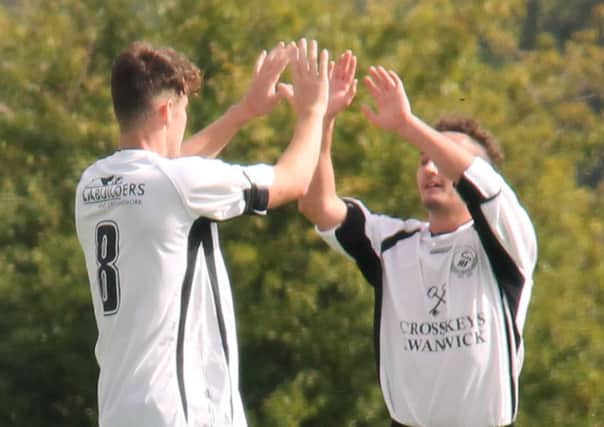 Lewis Mason and Dean Owen celebrate. Pic by Adam Gross