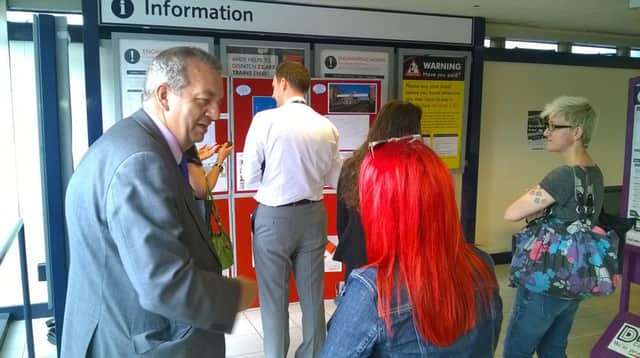 Residents view the new proposals for Alfreton train station.