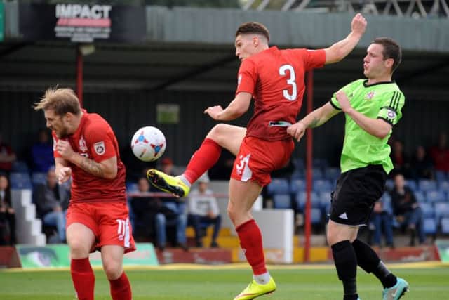 Alfreton Town v Stalybridge Celtic.
A Sam Jones strike hits the back of Jordan Robertson.