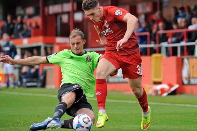 Alfreton Town v Stalybridge Celtic.
Sam Jones in a first half tussle.