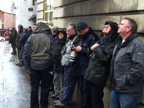 These chaps braved the rain hoping to catch a glimpse of an extremely rare bird