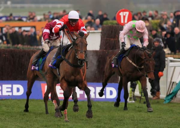 GOLDEN GLORY -- novice Coneygree fights off Djakadam (right) and Road To Riches to win the 2015 Cheltenham Gold Cup. (PHOTO BY: Nick Potts/PA Wire).