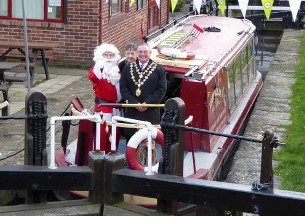 The Mayor and Mayoress of Chesterfield,  Barry and June Bingham, on the Santa Special cruise on Chesterfield Canal.