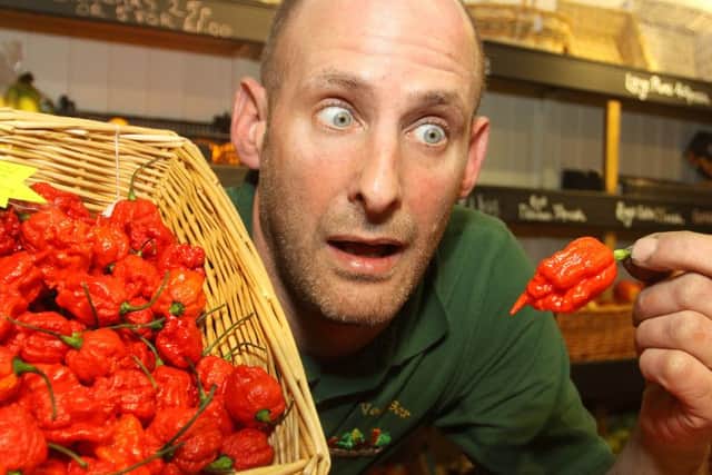 Greengrocer Mathew Taylor with the world's hottest chilli