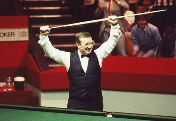 May 1985:  Dennis Taylor of Northern Ireland celebrates victory in the Embassy World Snooker Championship Final at the Crucible Theatre in Sheffield, England. Taylor beat Steve Davis 18-17 in a dramatic black ball finish.
Mandatory Credit: Adrian Murrell /Allsport