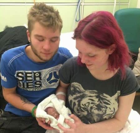 Ryan Wagstaff and Lily Barron with baby Leo who was stillborn