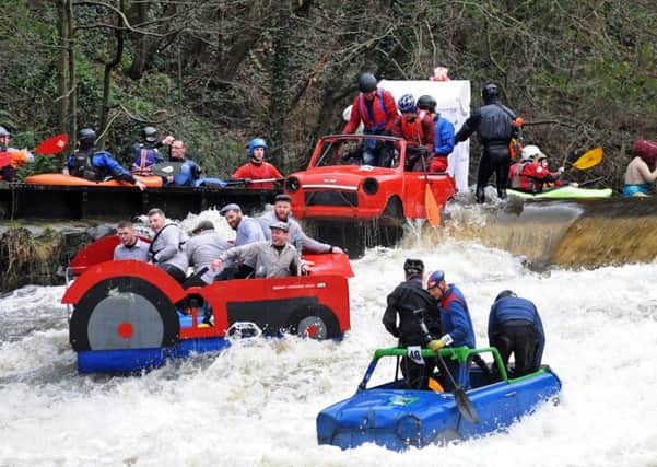 Matlock Boxing Day raft race.                                                                                                                   
The motorists' worst nightmare - a tractor and a caravan!