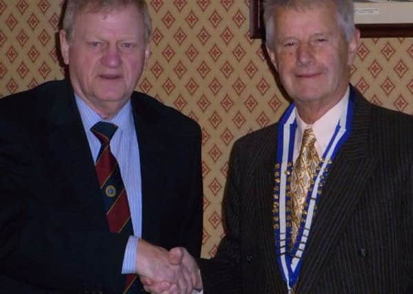 Clay Cross and District Probus Club's retiring president David Smith welcomes the new president David Holmes.